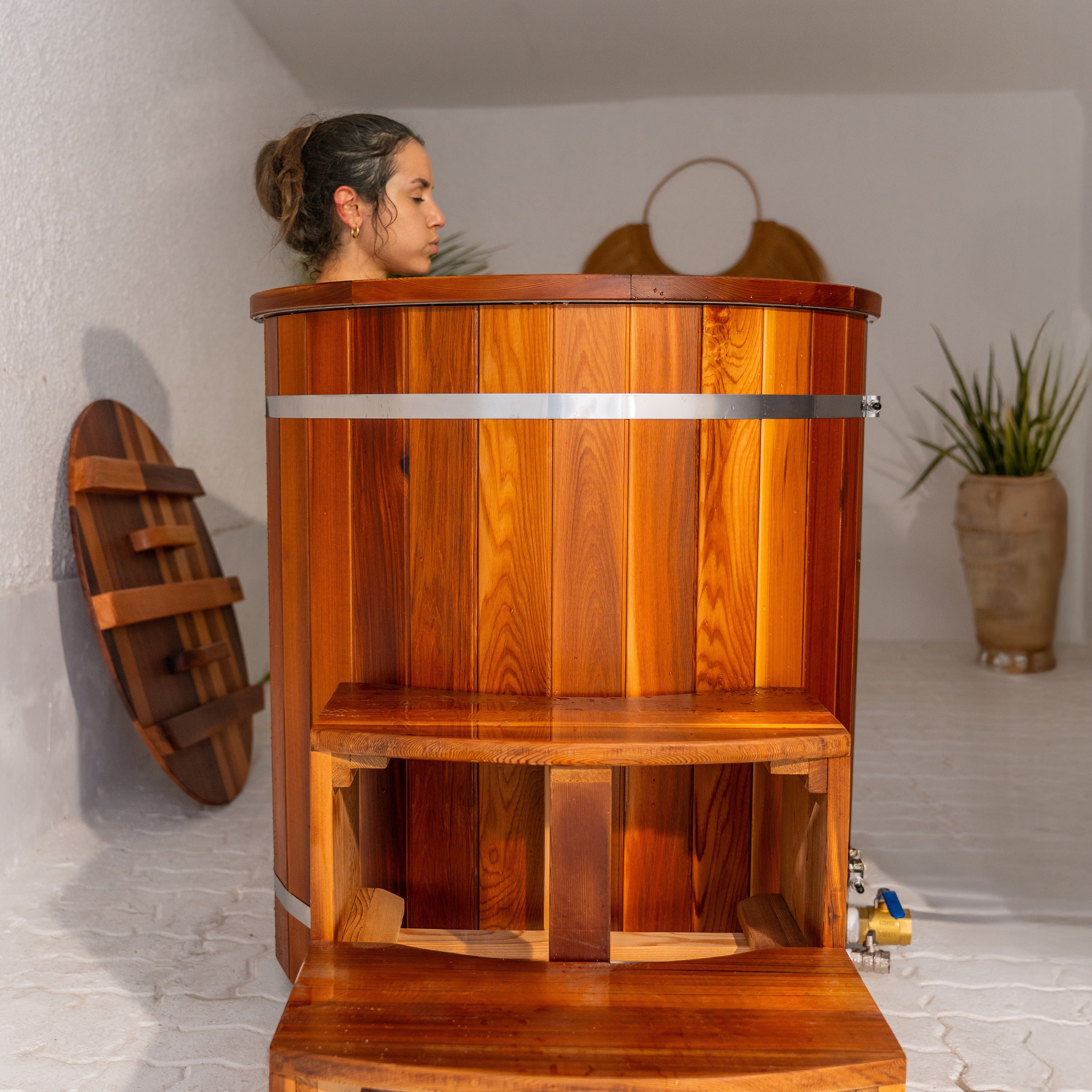KULA Shogun wooden barrel cold plunge with steps in bright living space