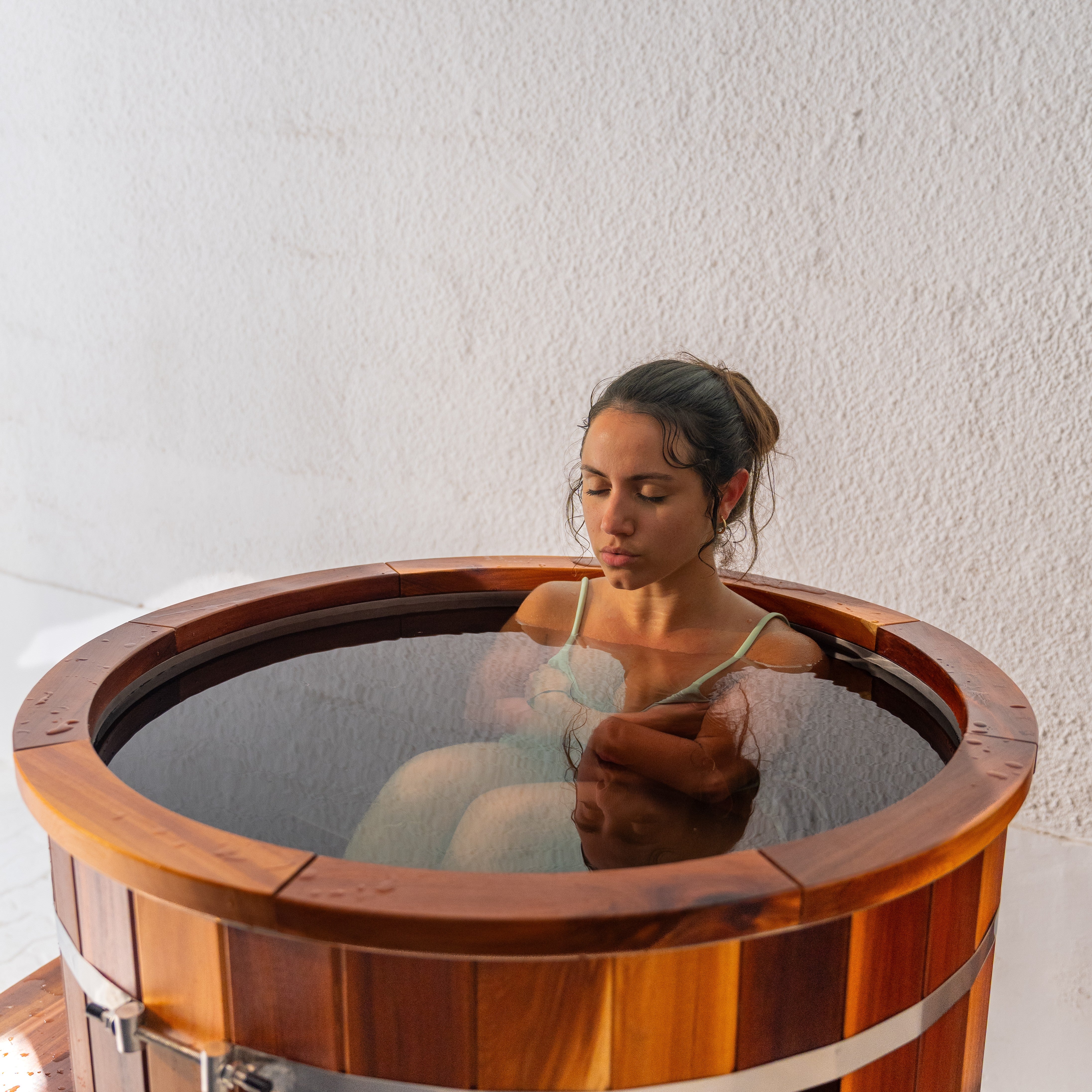 Cold plunge session in KULA Shogun red cedar barrel ice bath Dubai