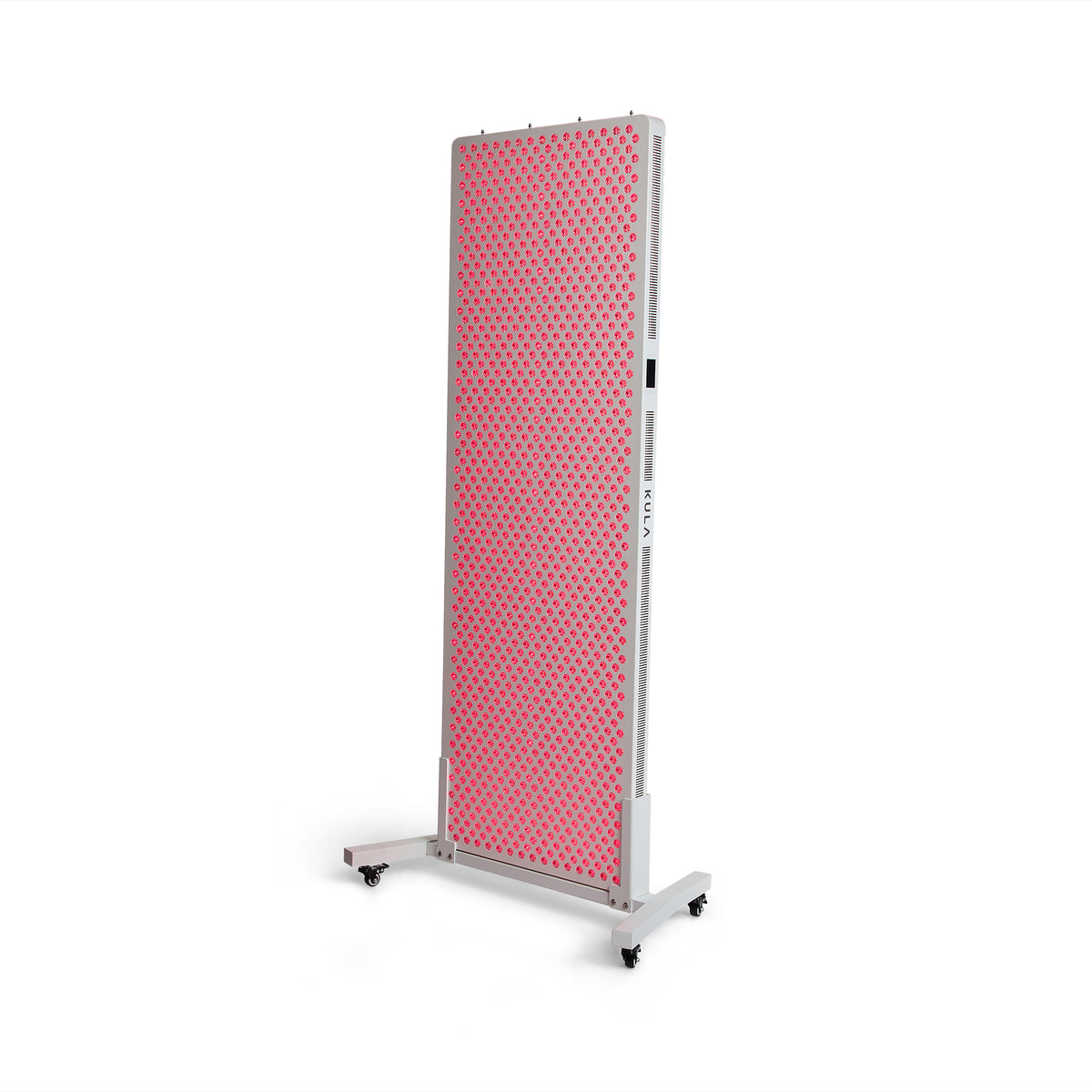 KULA THRYV Full-Body Red Light Therapy Panel on floor stand, switched on
