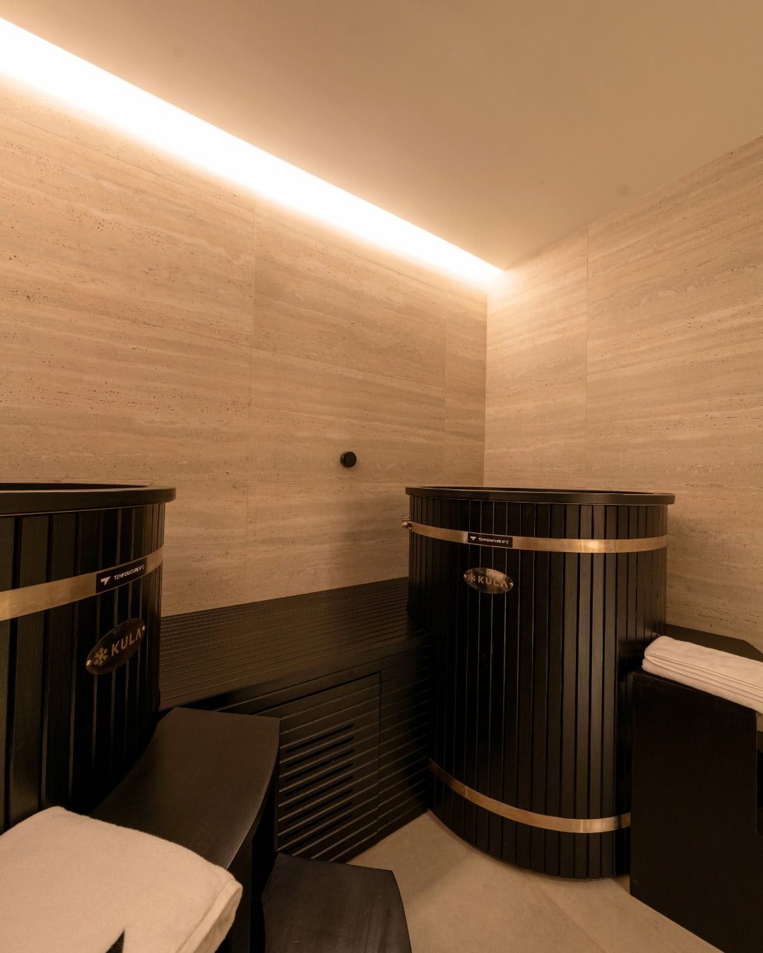 Black KULA barrel cold plunges in the FITCODE recovery room, Dubai